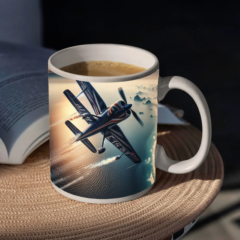 Aerobatic Biplane Flying Over Coastal Waters – Mugs