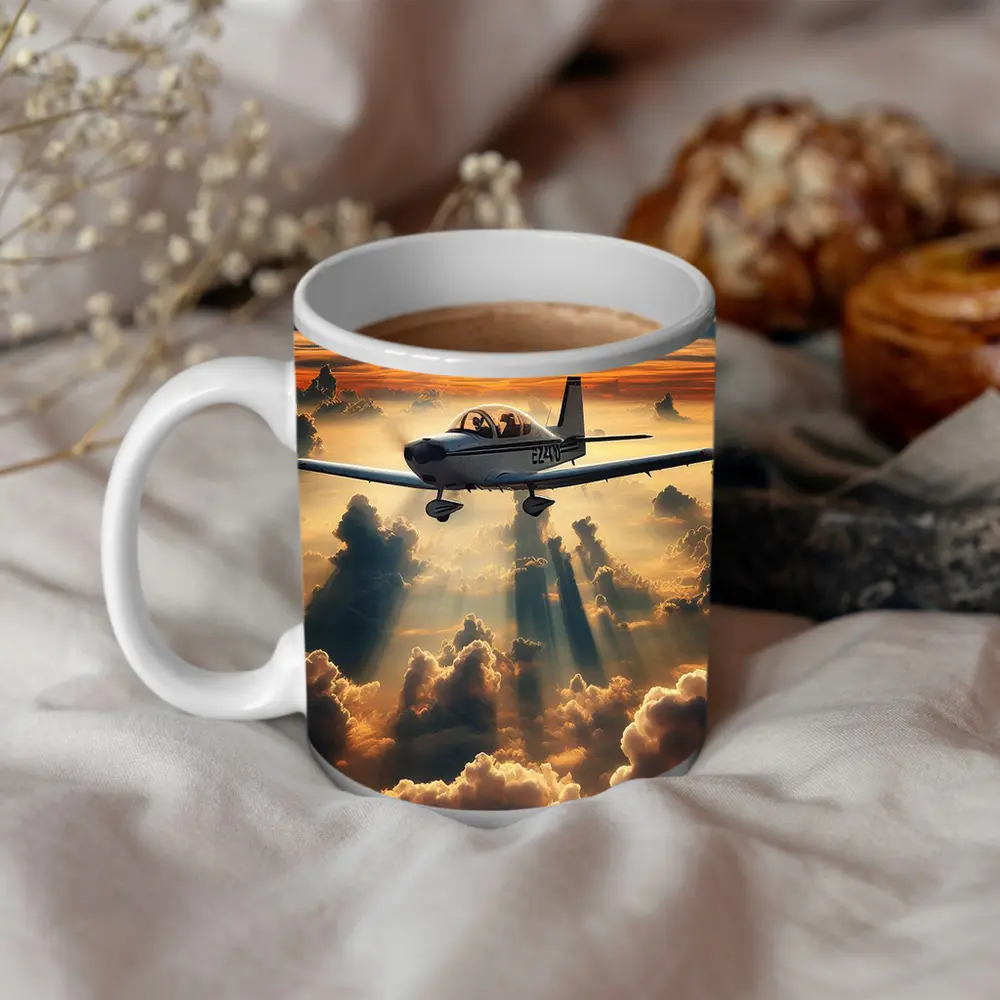 Small Airplane Flying Above Sunset Clouds – Mugs