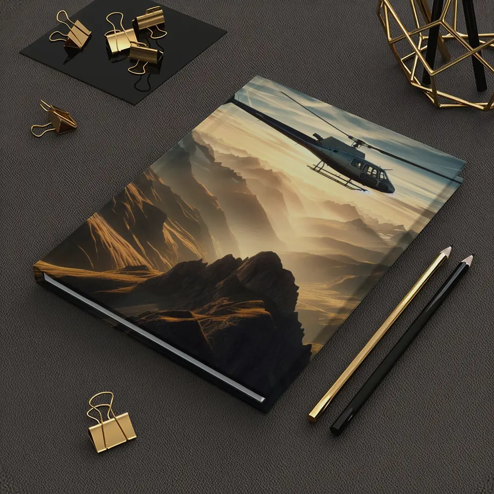 Helicopter Flying Over Misty Mountain Range – Notebooks