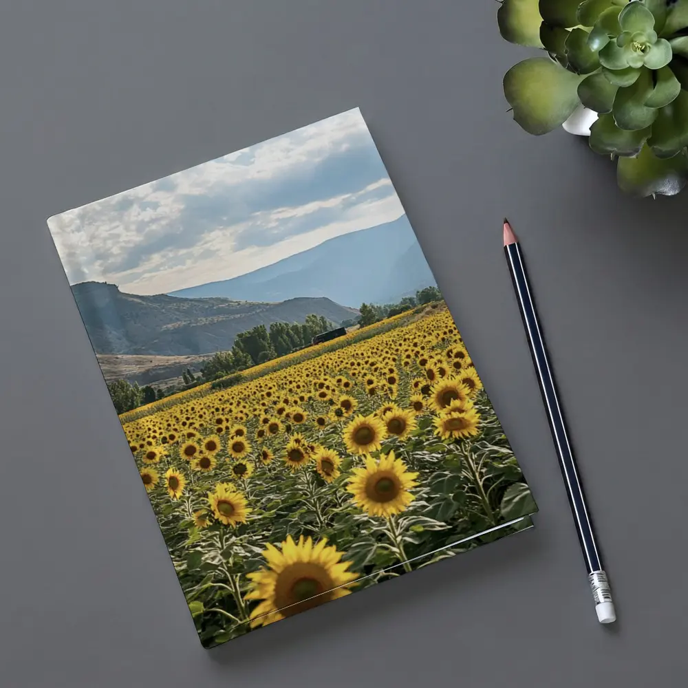 Sunflower Field With Mountain Valley Background – Notebooks