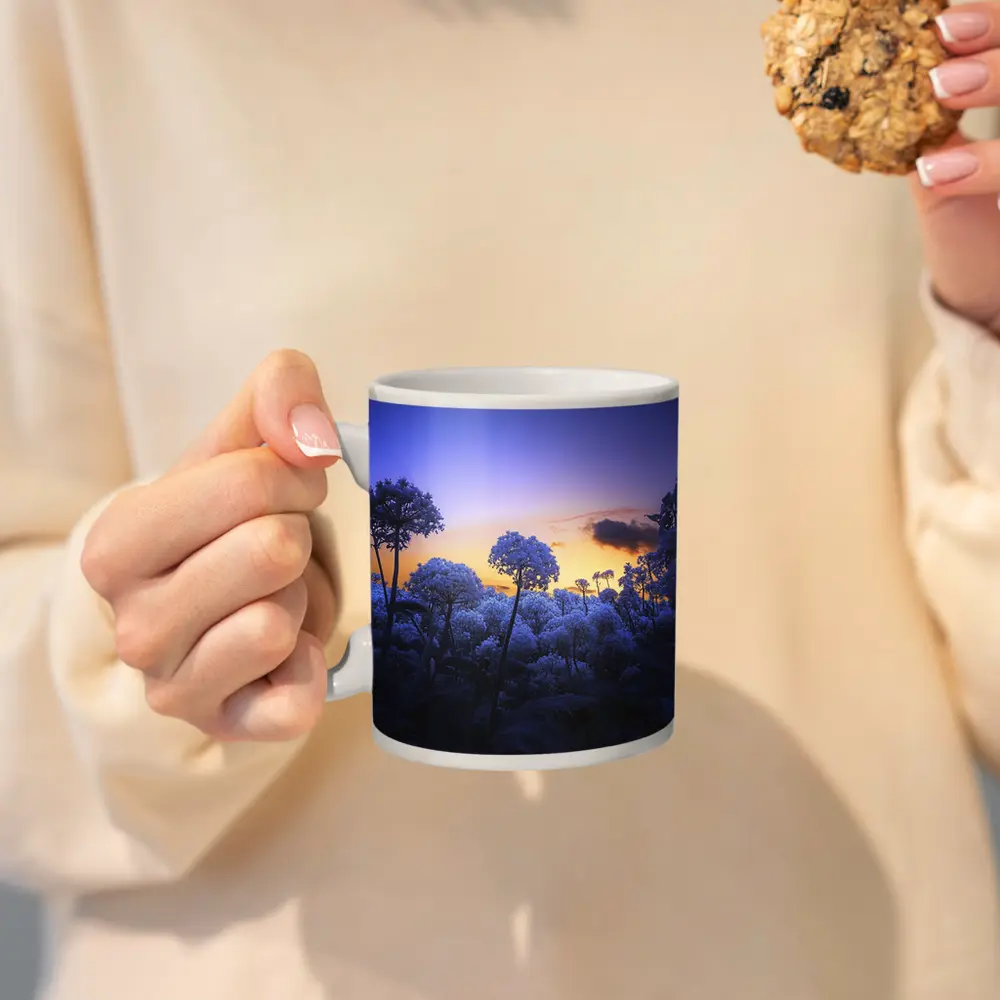 Blue Flowers Glowing Against Sunset Sky – Mugs