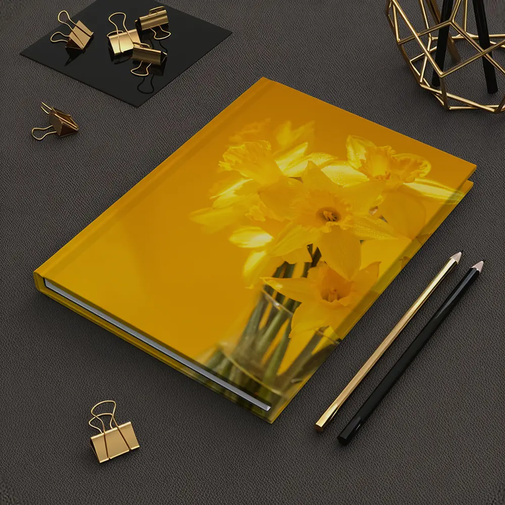 Yellow Daffodils In Glass Vase Golden Background – Notebooks