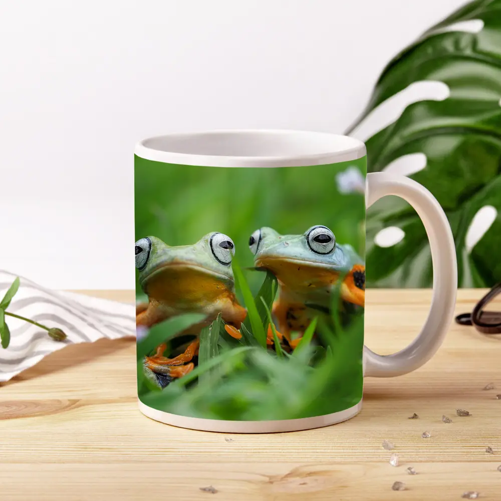 Two Tree Frogs Sitting in Green Grass – Mugs