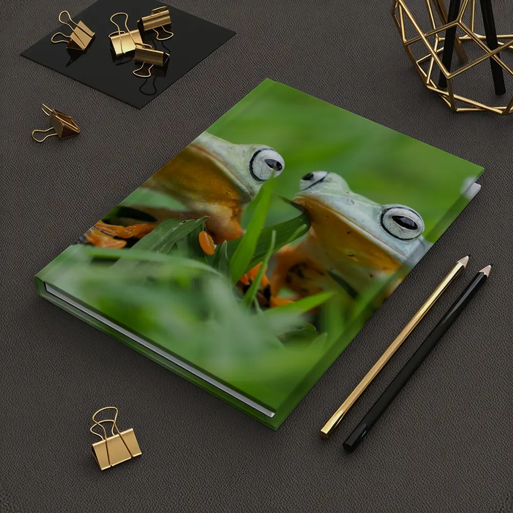 Two Tree Frogs Sitting in Green Grass – Notebooks