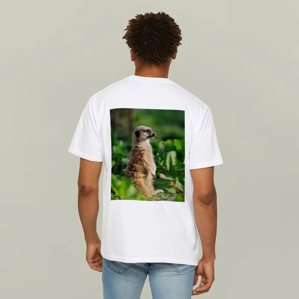 Meerkat Standing Alert In Green Foliage – T-Shirts