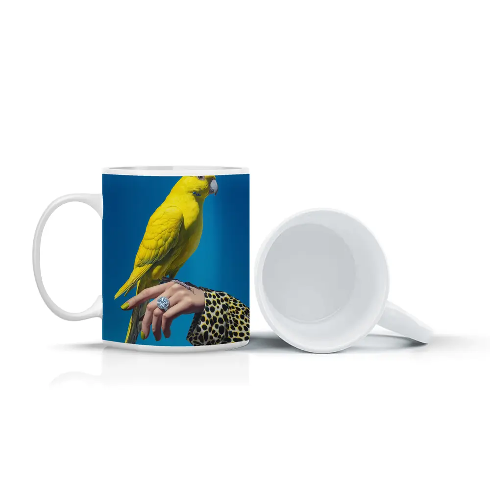 Yellow Parrot on Hand Blue Background – Mugs