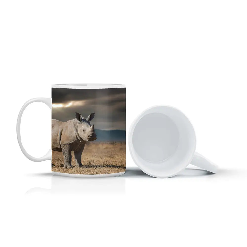Young White Rhino Standing On African Savanna – Mugs