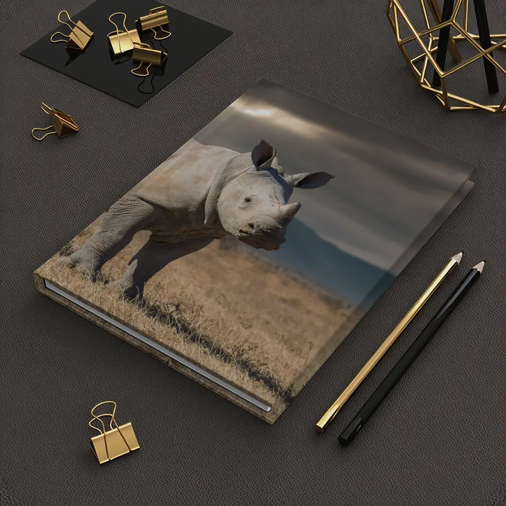 Young White Rhino Standing On African Savanna – Notebooks