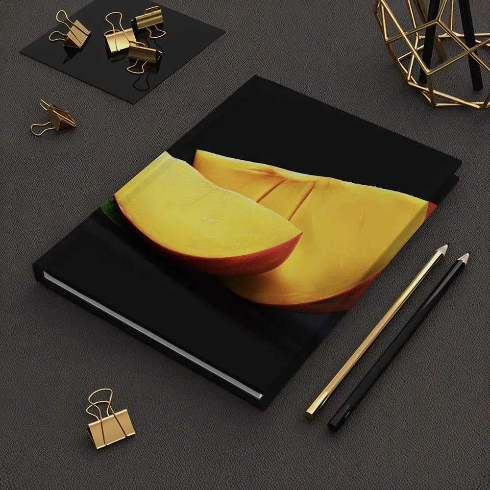 Fresh Mango Slices on Dark Background – Notebooks