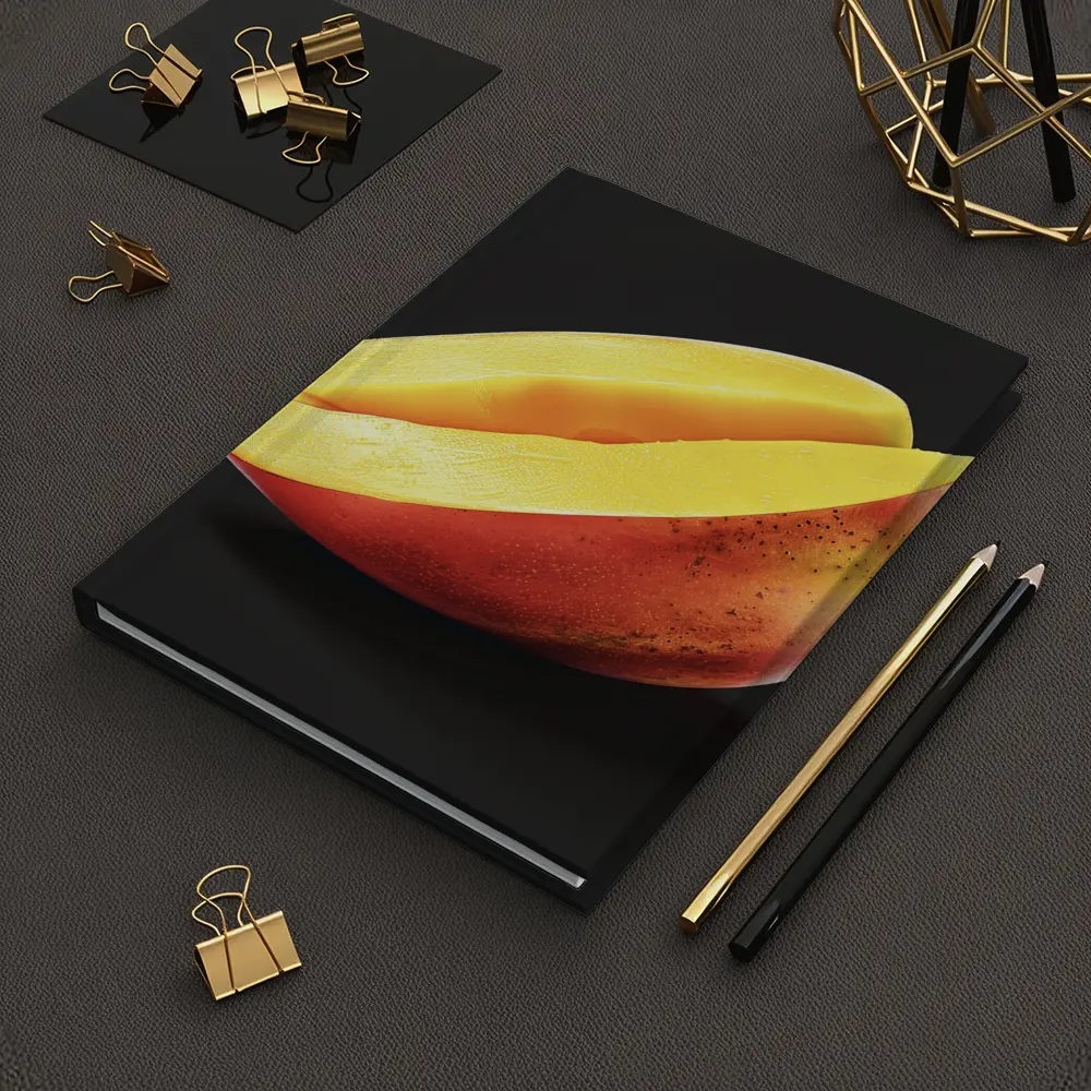 Sliced Mango Half on Dark Background – Notebooks