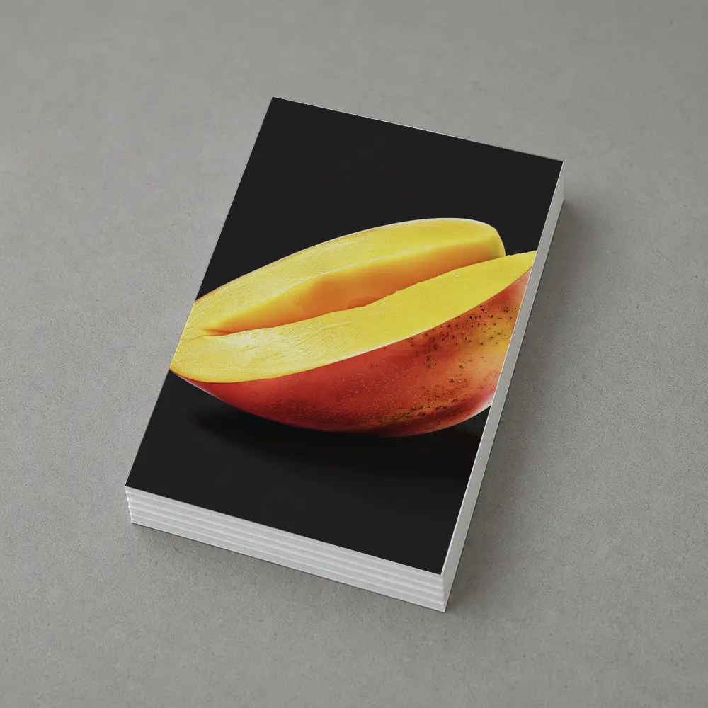 Sliced Mango Half on Dark Background – Postcards