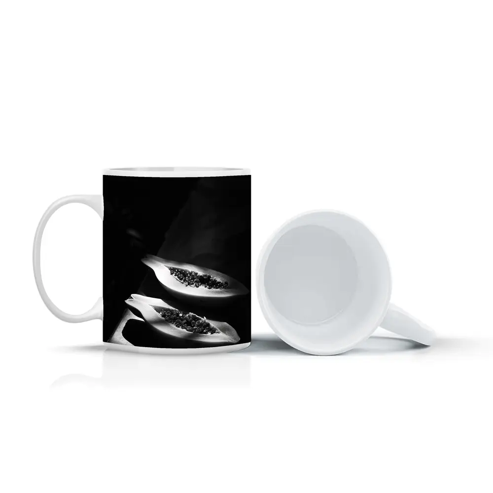 Black And White Papaya Halves Dark Background – Mugs