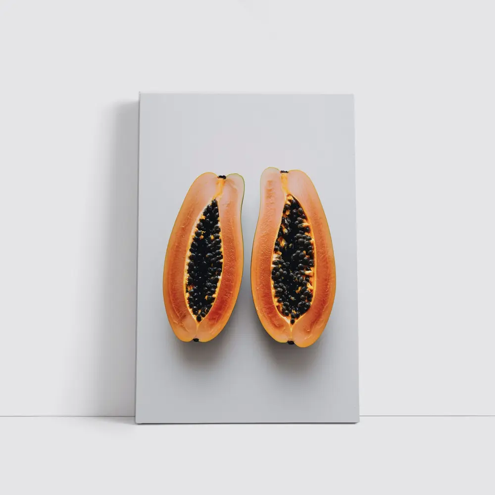 Sliced Papaya Halves on White Background – Wall Art