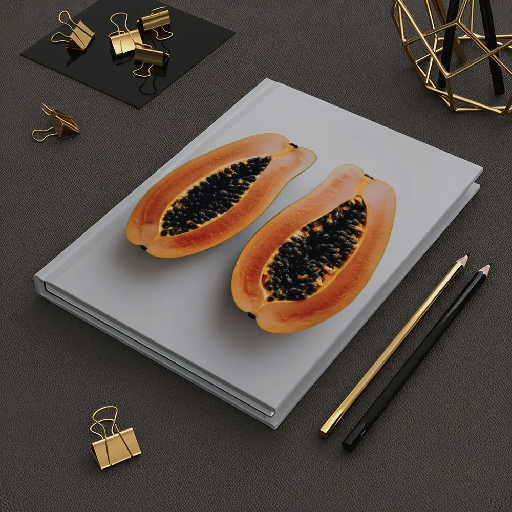 Sliced Papaya Halves on White Background – Notebooks