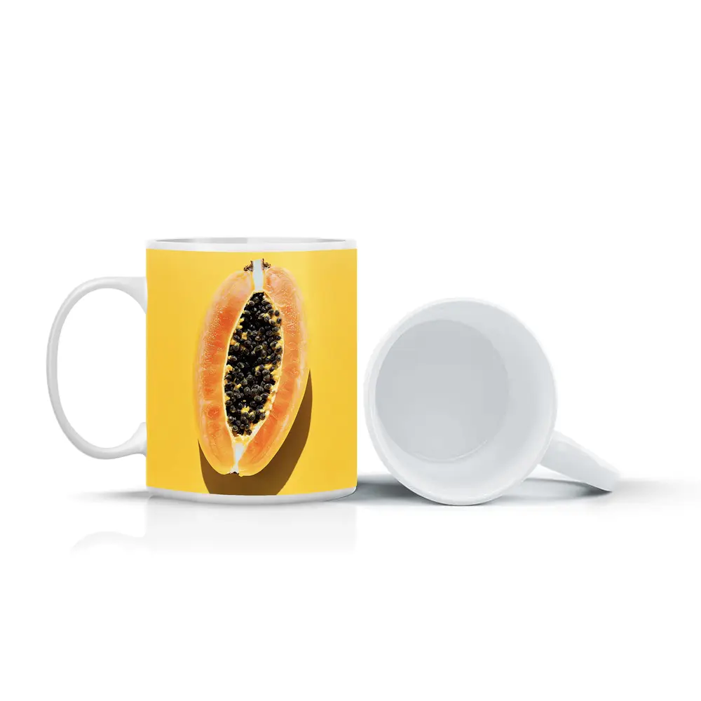 Sliced Papaya On Yellow Background – Mugs