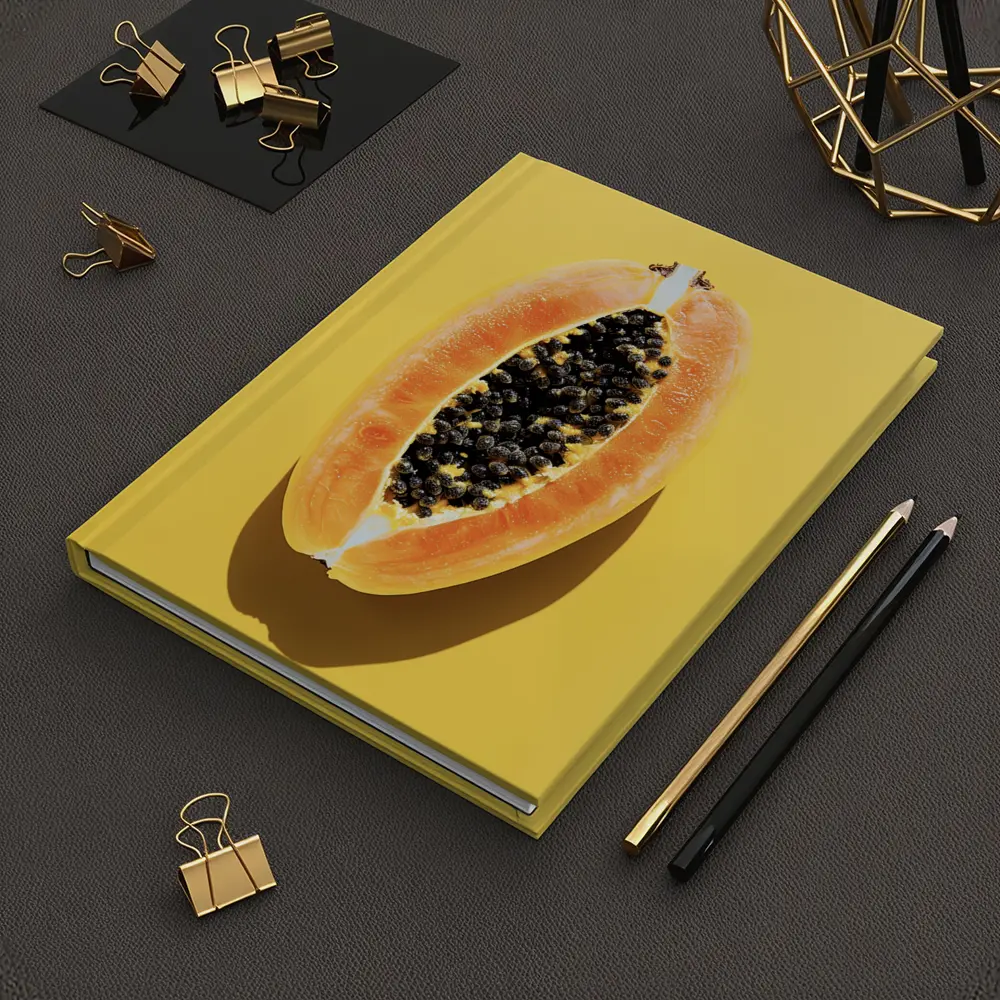 Sliced Papaya On Yellow Background – Notebooks