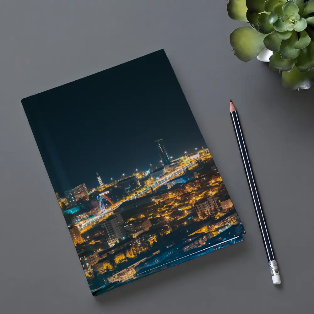 City At Night Glowing Urban Skyline View – Notebooks