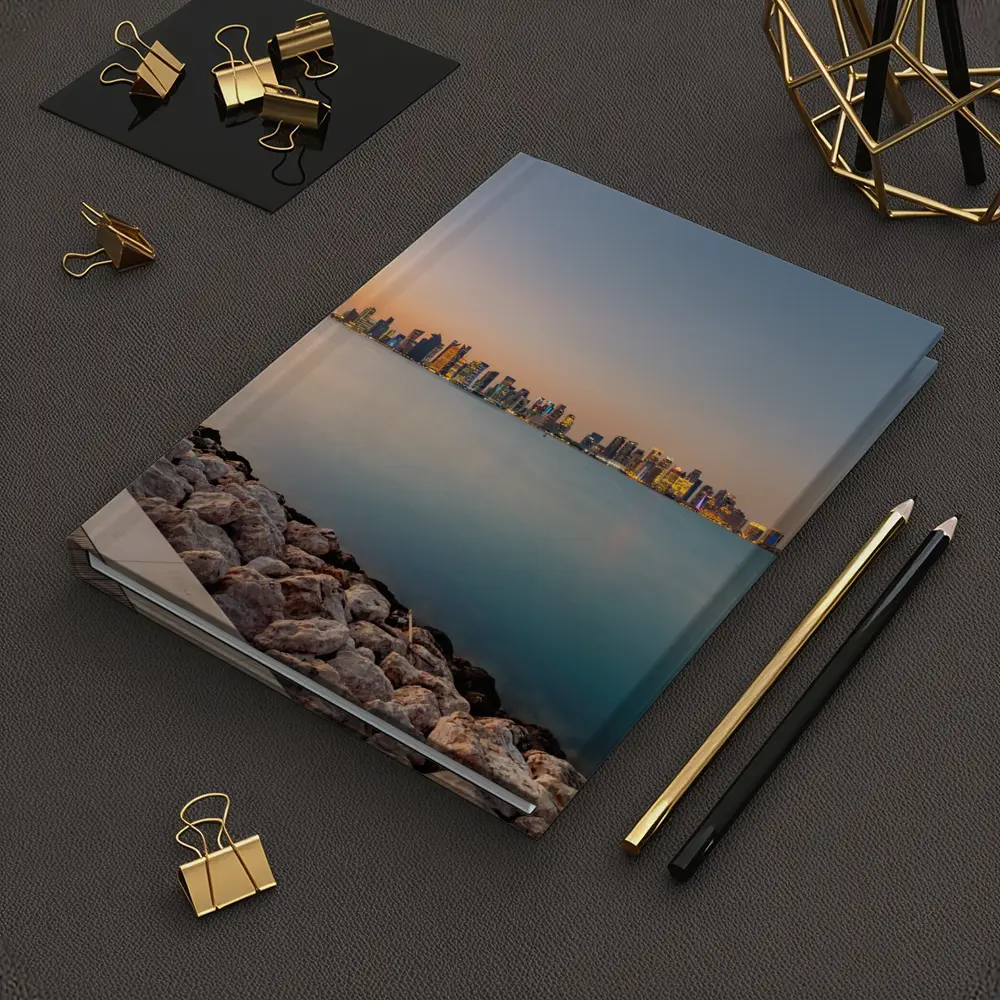 Doha Qatar Skyline at Sunset Over Water – Notebooks