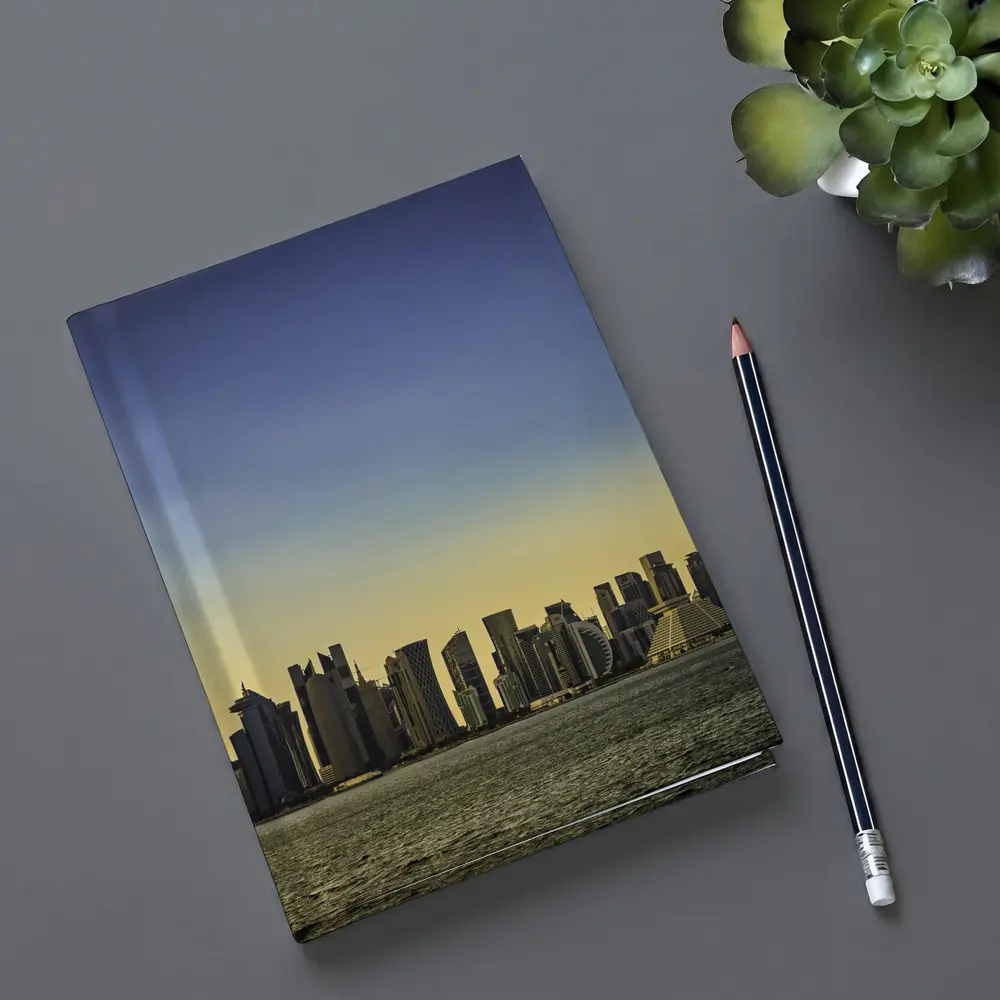 Doha Qatar Skyline Over Golden Water – Notebooks