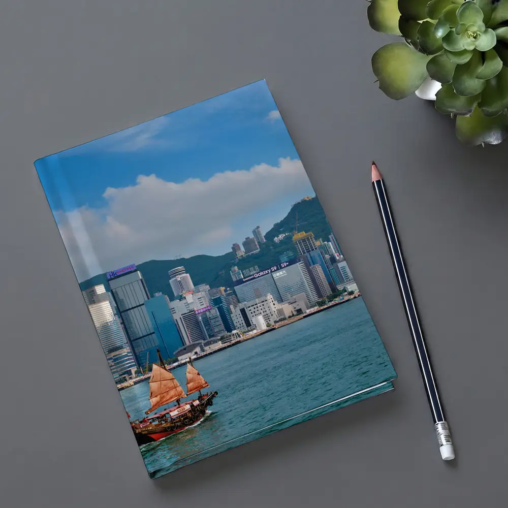 Hong Kong Harbor Skyline with Traditional Junk Boat – Notebooks