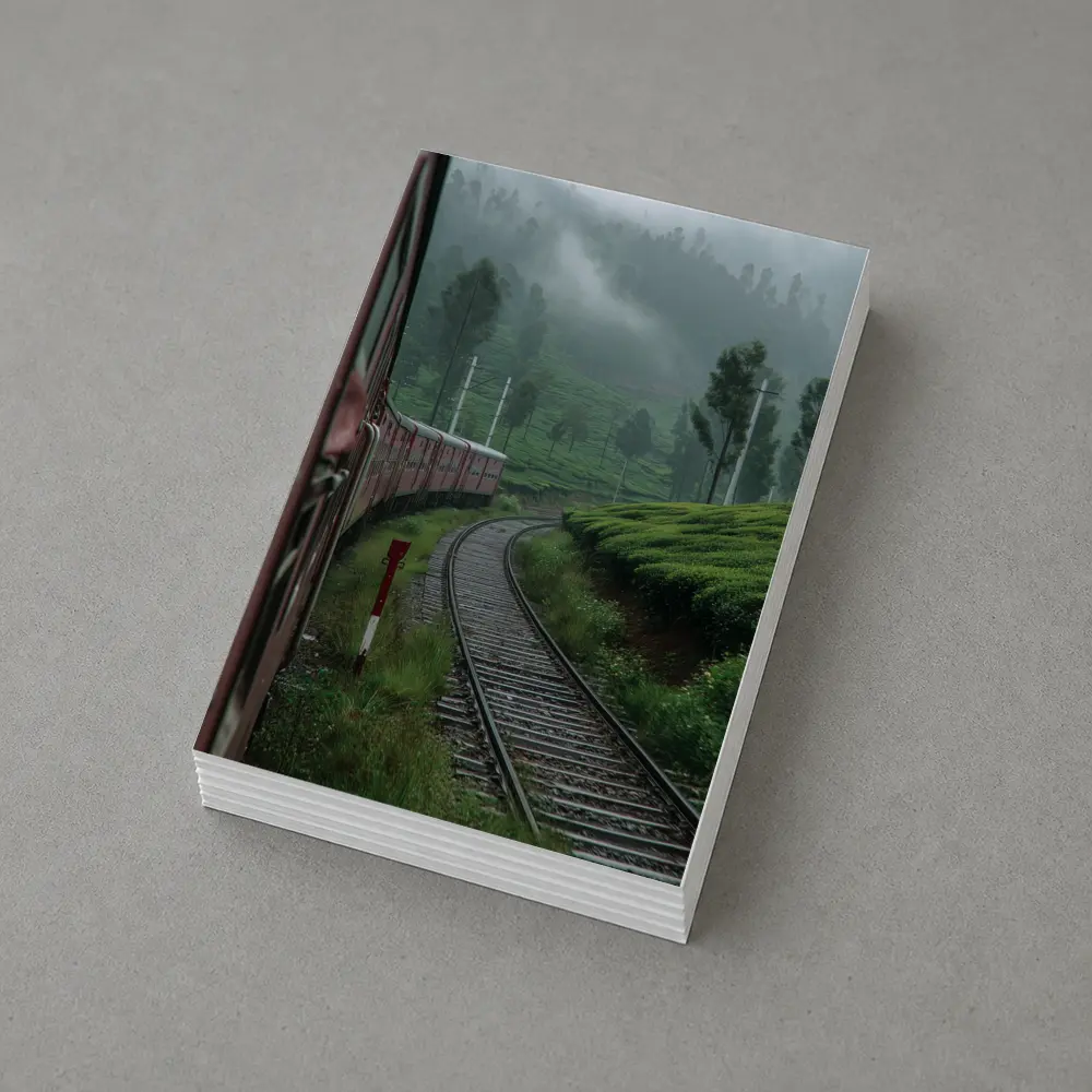 Red Train Winding Through Misty Tea Plantations – Postcards