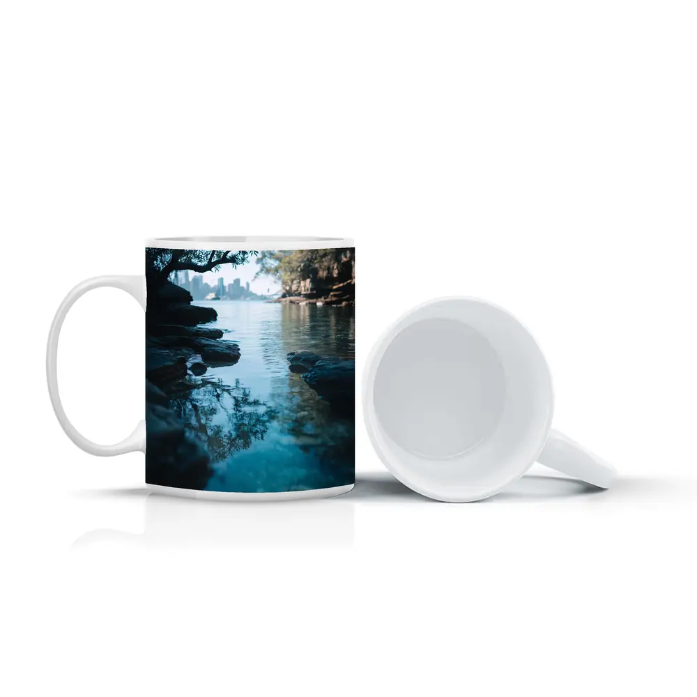 Rocky Shore City Skyline Reflection Water – Mugs