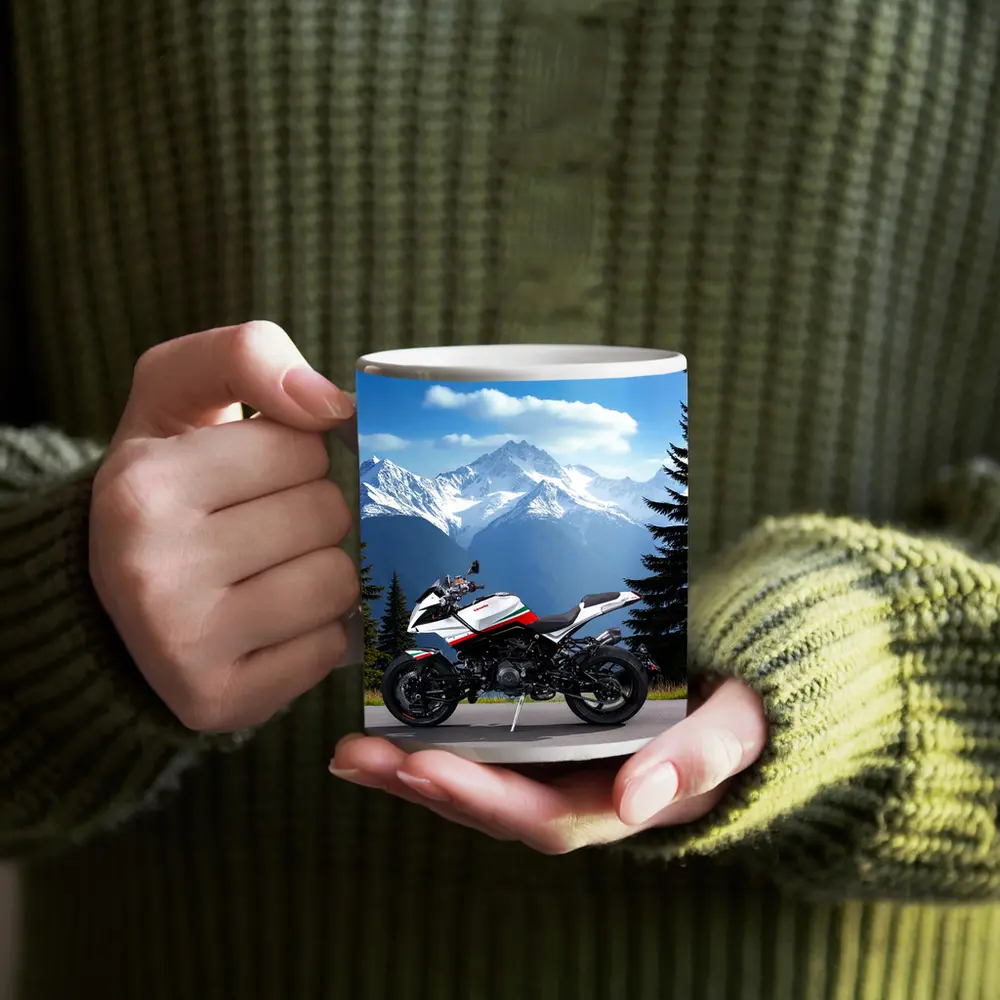 Aprilia Motorcycle Parked Against Snowy Mountains – Mugs