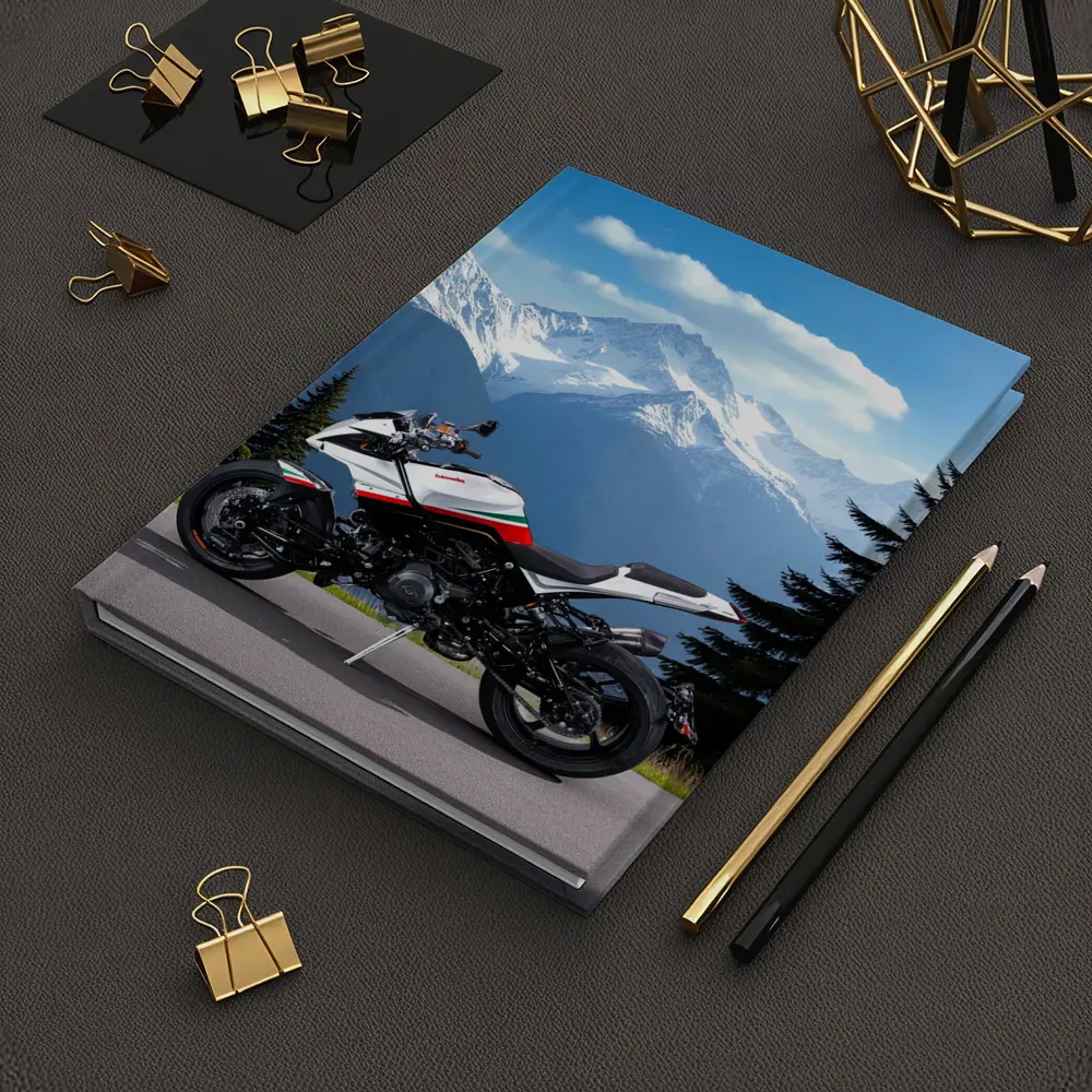 Aprilia Motorcycle Parked Against Snowy Mountains – Notebooks