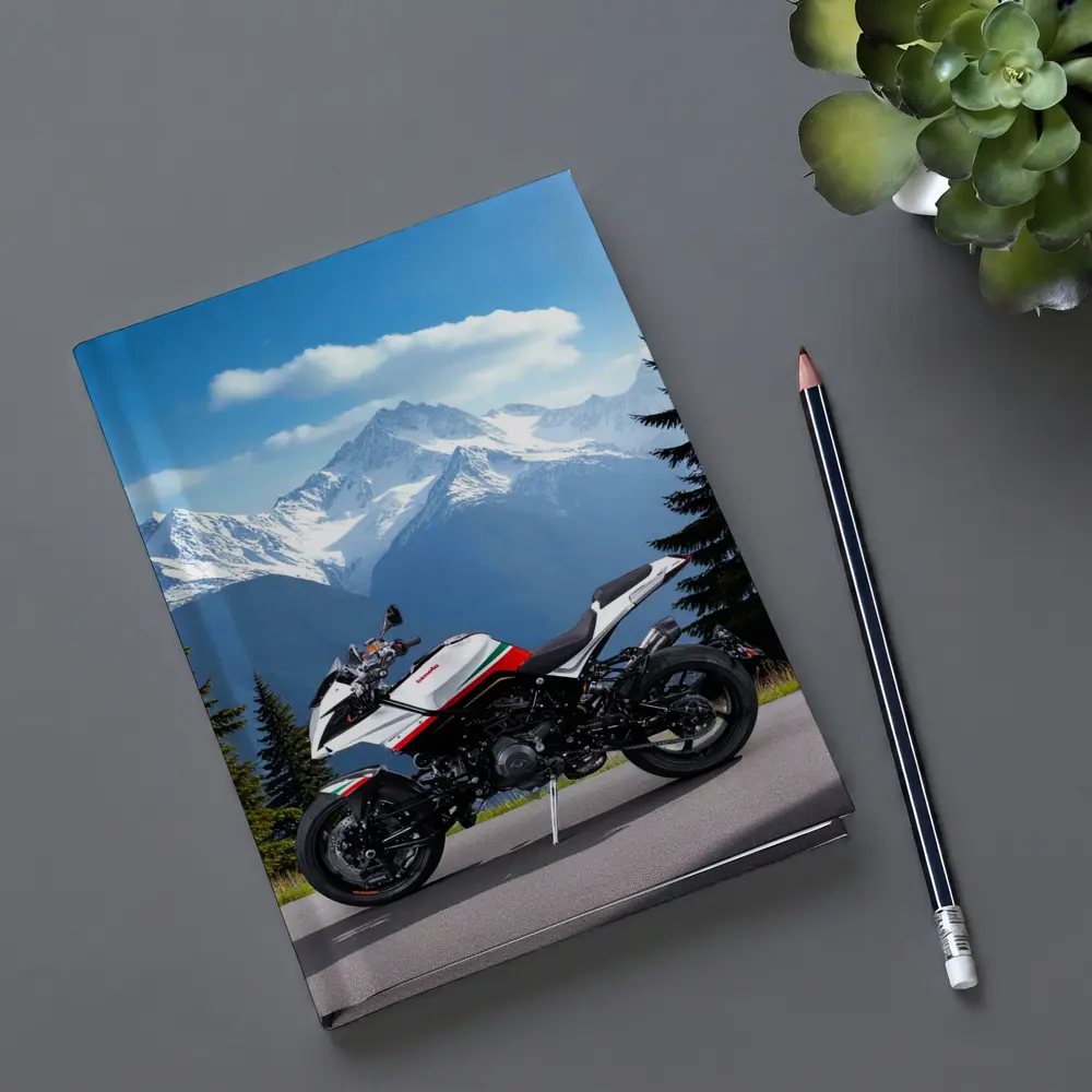 Aprilia Motorcycle Parked Against Snowy Mountains – Notebooks