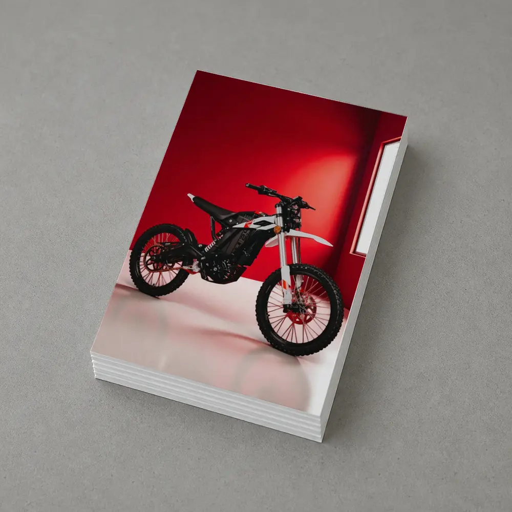 Electric Dirt Bike Against Bold Red Wall – Postcards