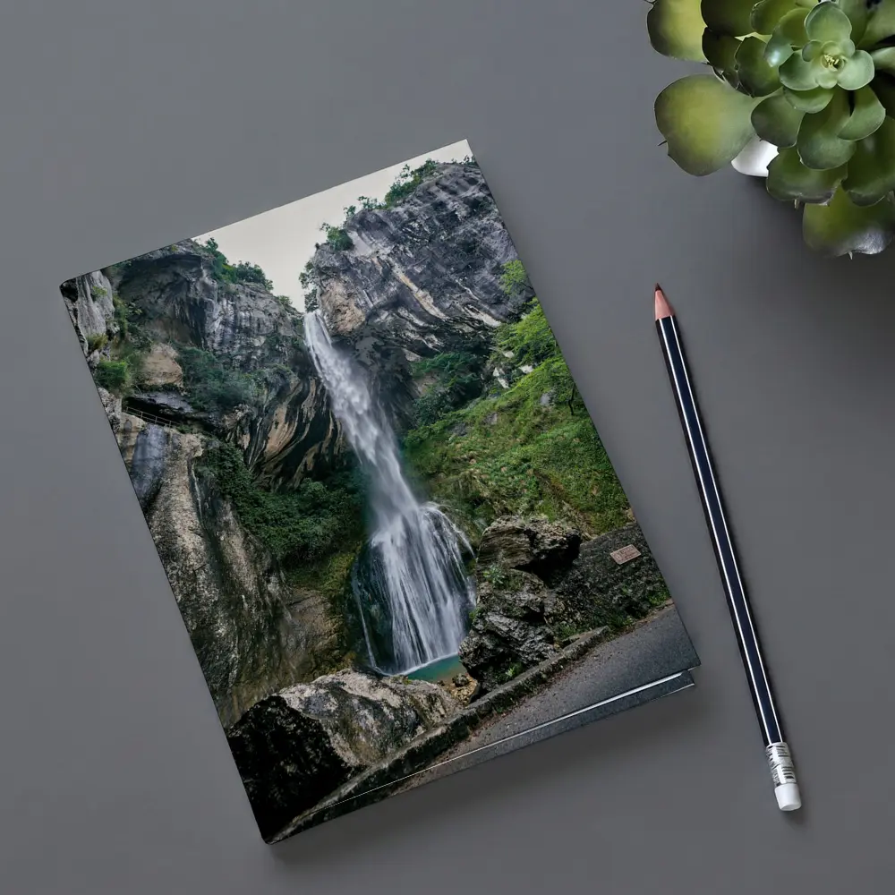 Tall Waterfall Cascading Down Rocky Cliffs – Notebooks
