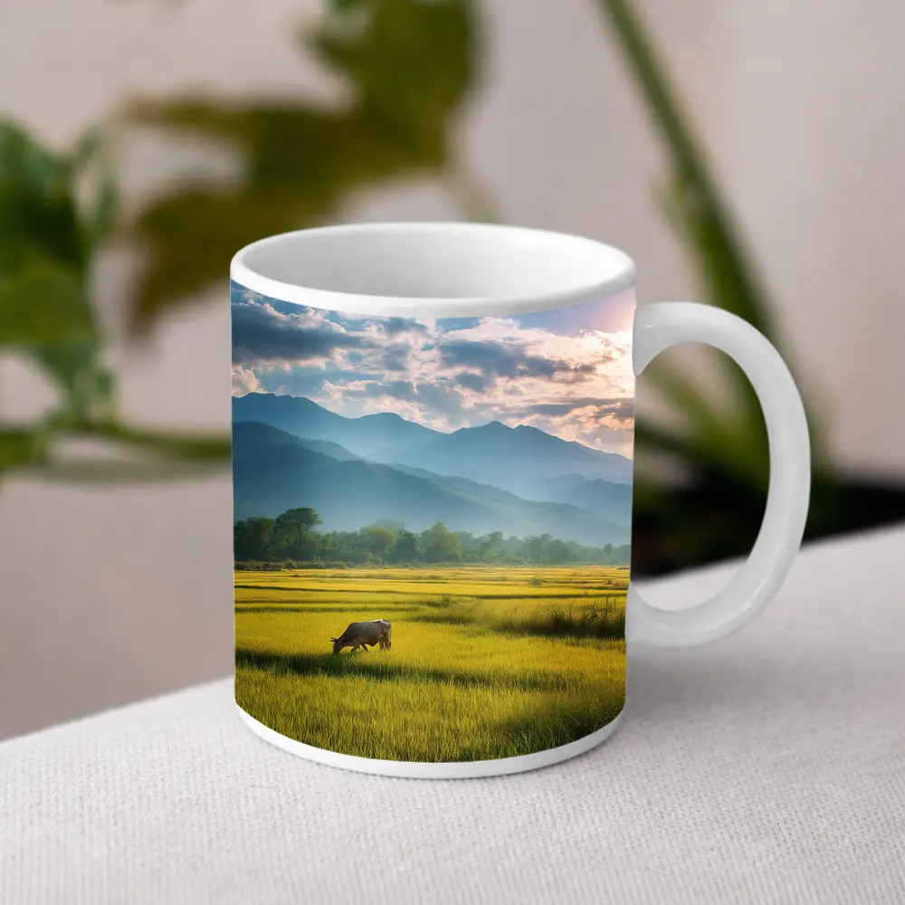 Buffalo Grazing Green Rice Fields Mountain Backdrop – Mugs
