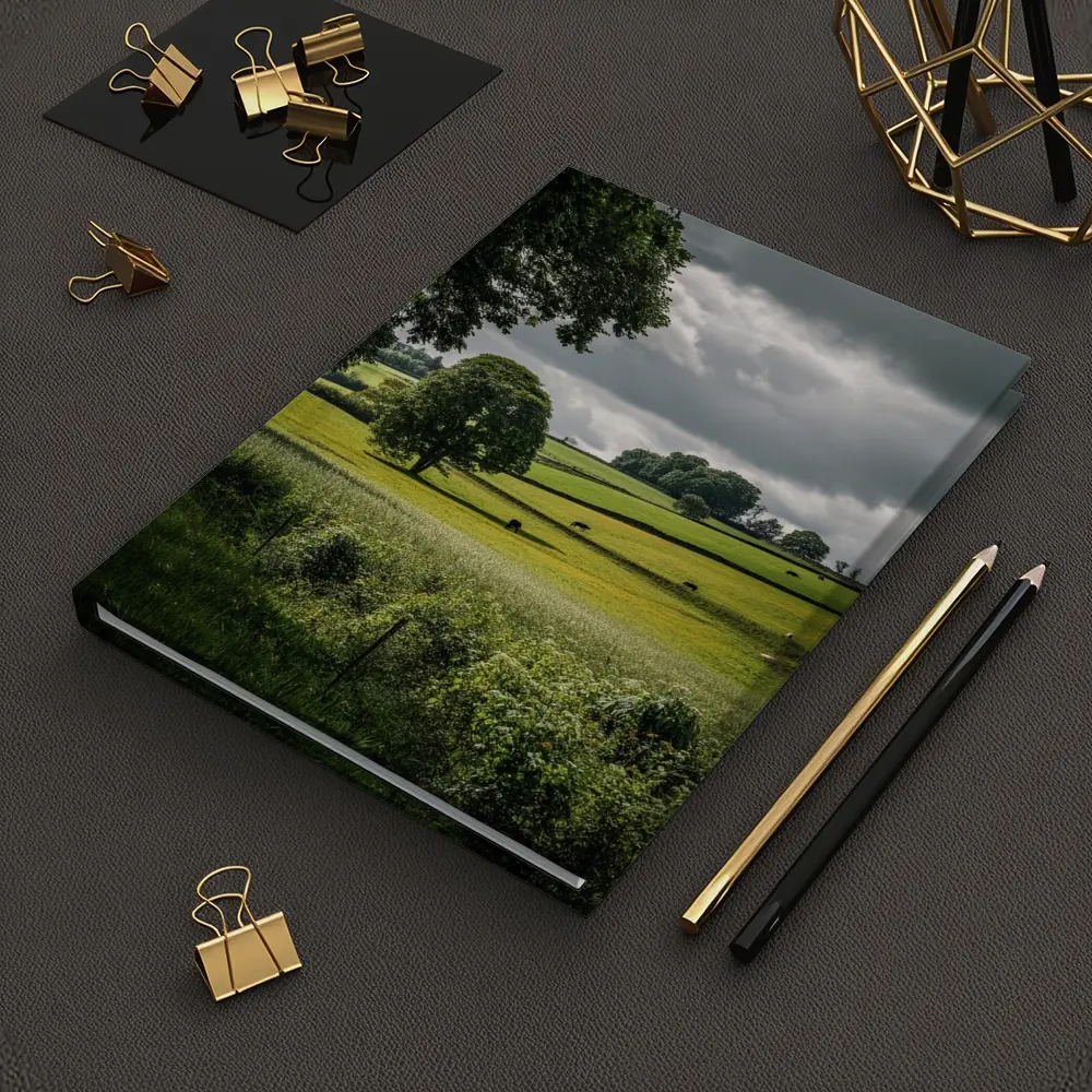 Rolling Green Fields Under Stormy Cloudy Sky – Notebooks