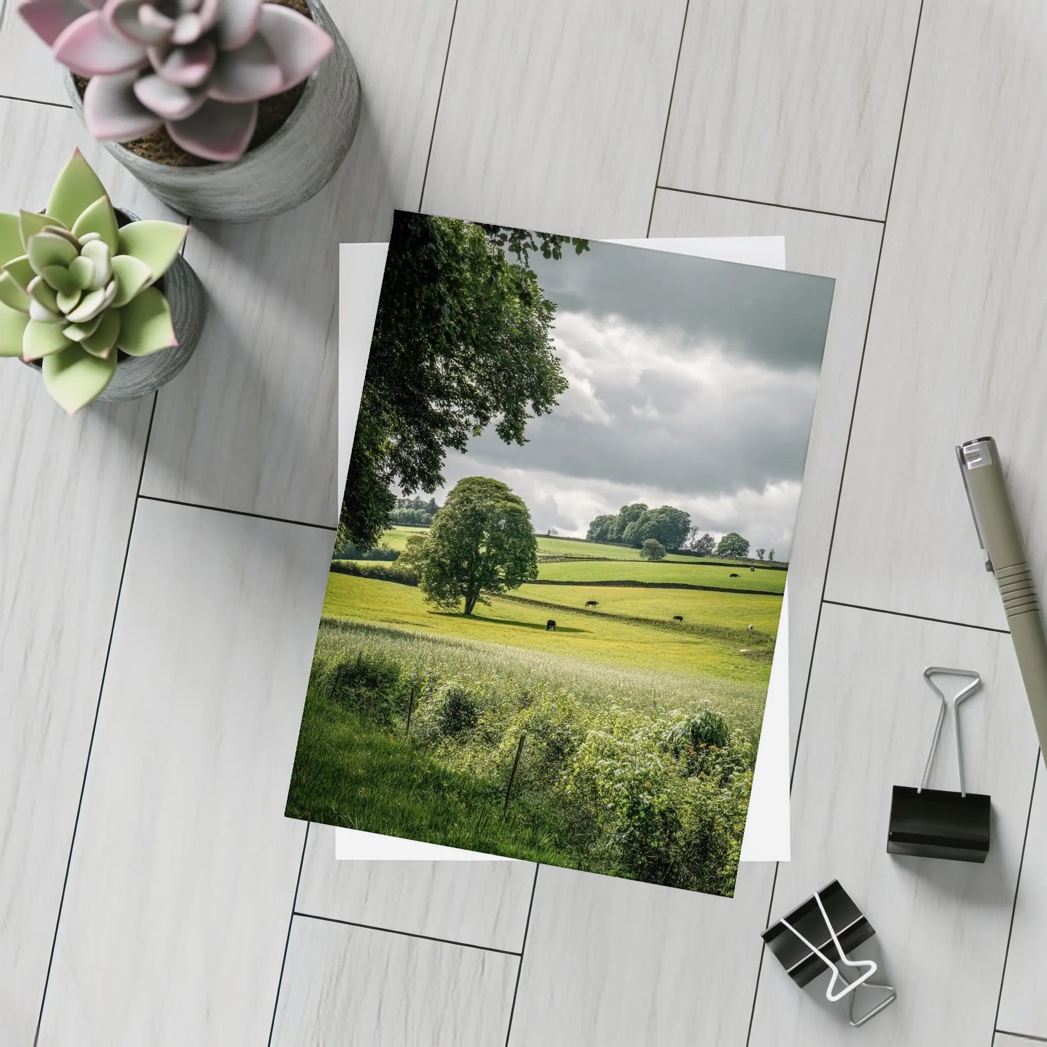 Rolling Green Fields Under Stormy Cloudy Sky – Postcards