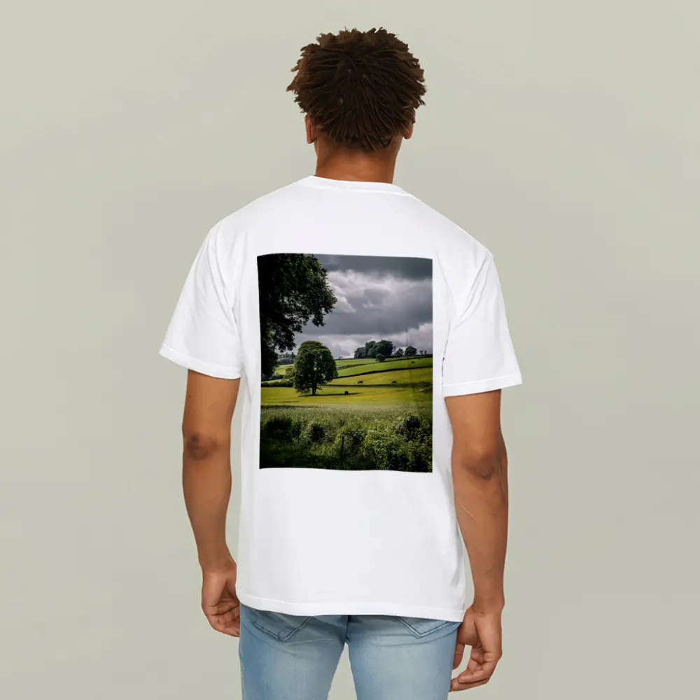 Rolling Green Fields Under Stormy Cloudy Sky – T-Shirts