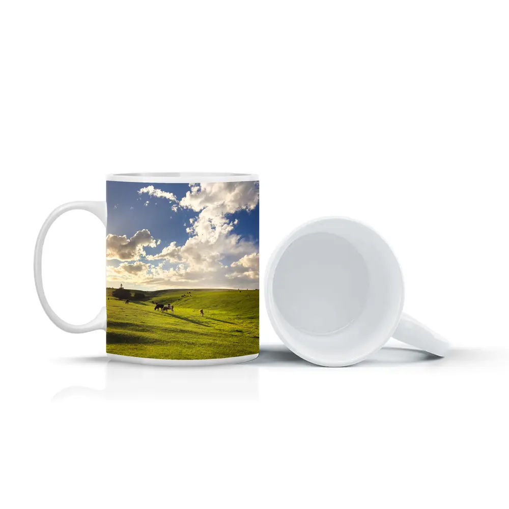 Cows Grazing Green Rolling Hills Sunny Sky – Mugs