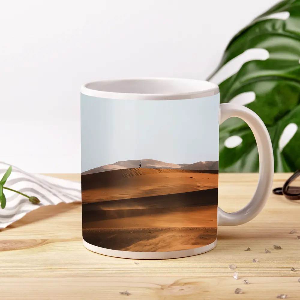 Lone Figure Walking Desert Sand Dunes – Mugs