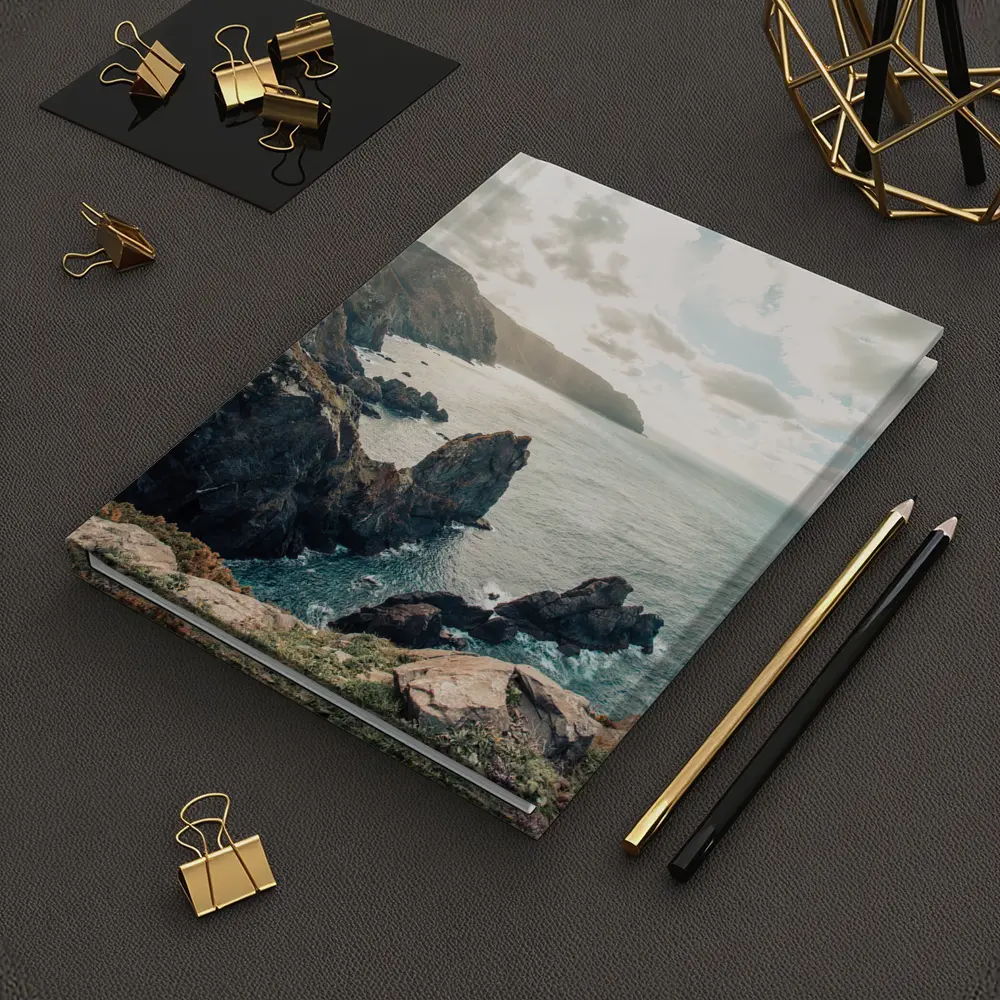 Rocky Coastal Cliffs Over Blue Ocean – Notebooks
