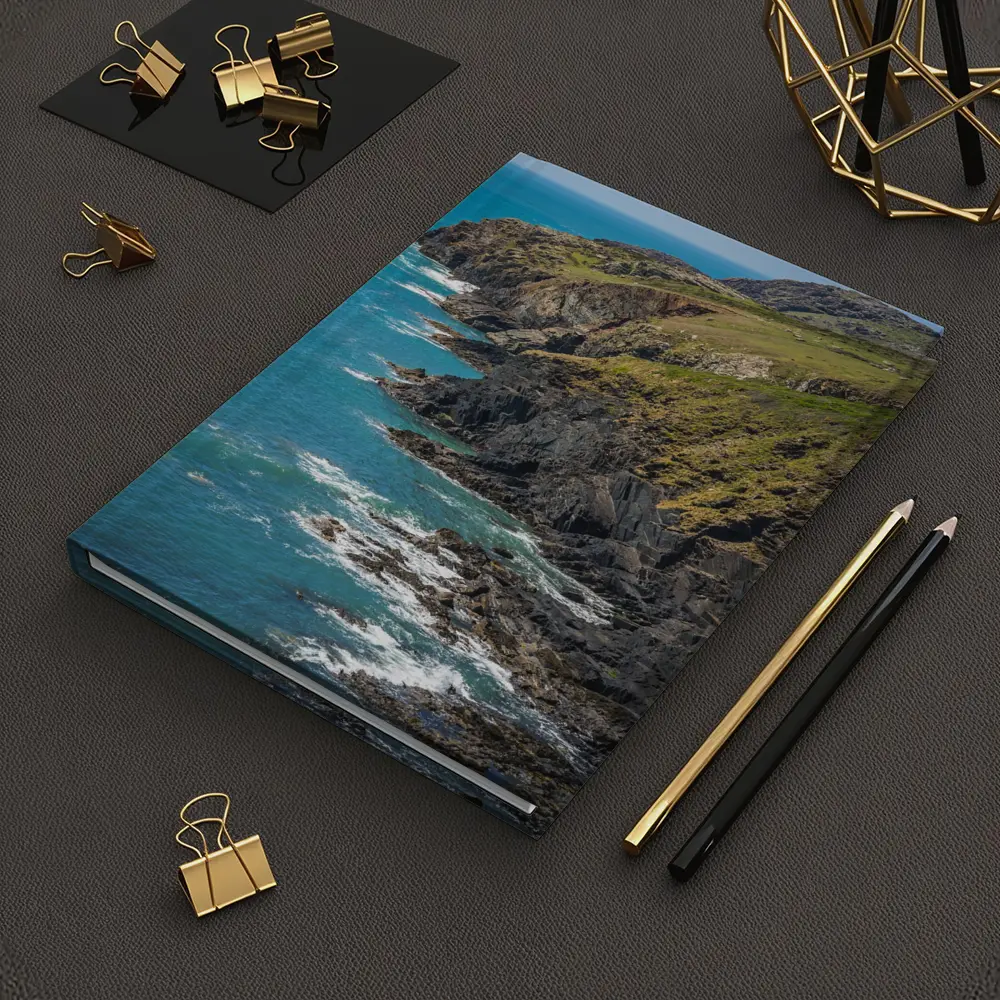 Rocky Coastal Cliffs Above Turquoise Ocean Waves – Notebooks