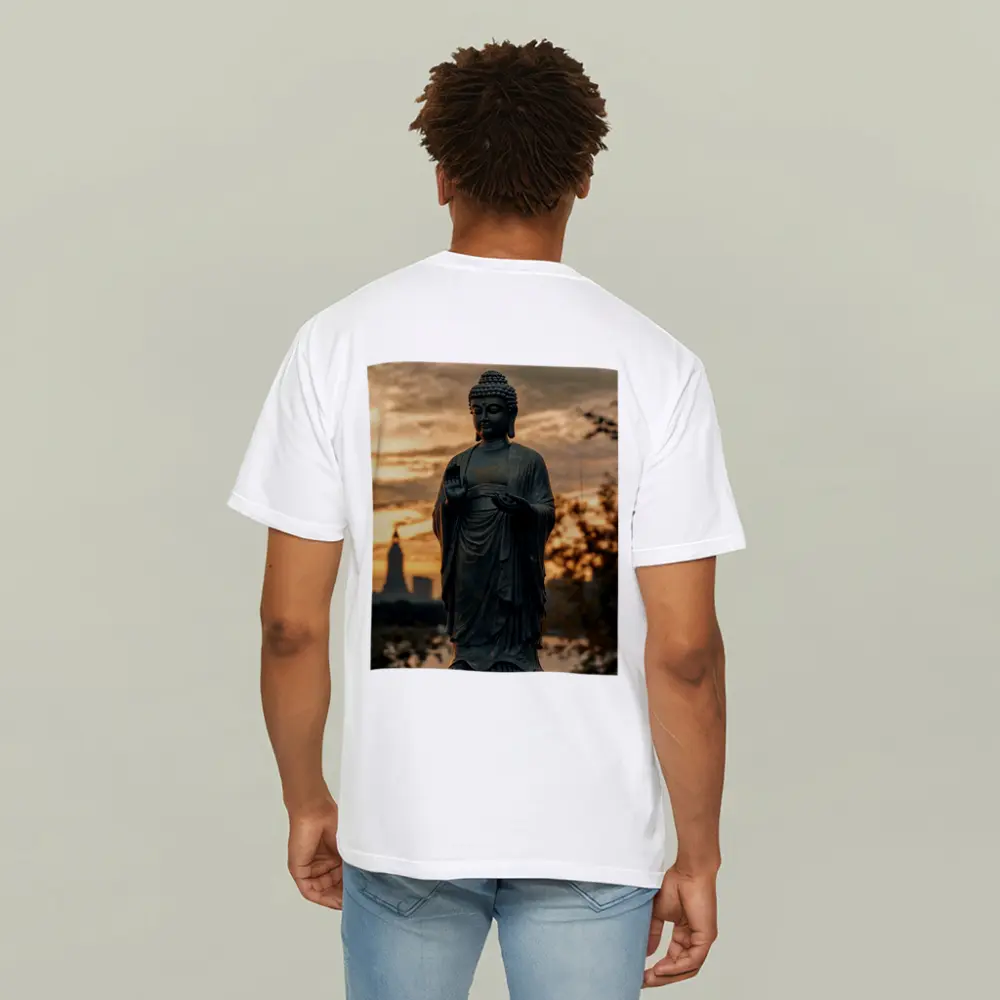 Bronze Buddha Statue Glowing Sunset City – T-Shirts