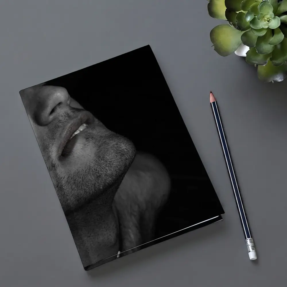 Black and White Male Portrait Dark Background – Notebooks