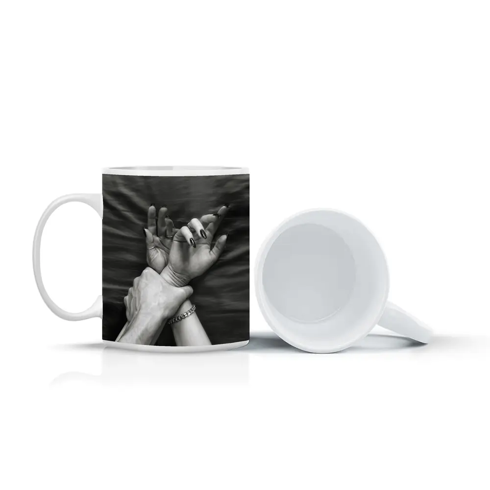 Black and White Hands Grasping Bed Sheet – Mugs