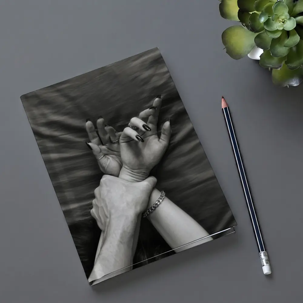 Black and White Hands Grasping Bed Sheet – Notebooks