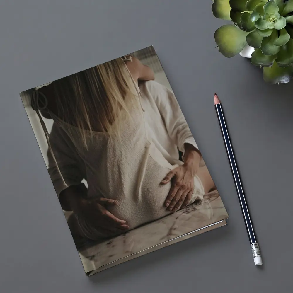 Pregnant Woman Couple Embrace Marble Table – Notebooks