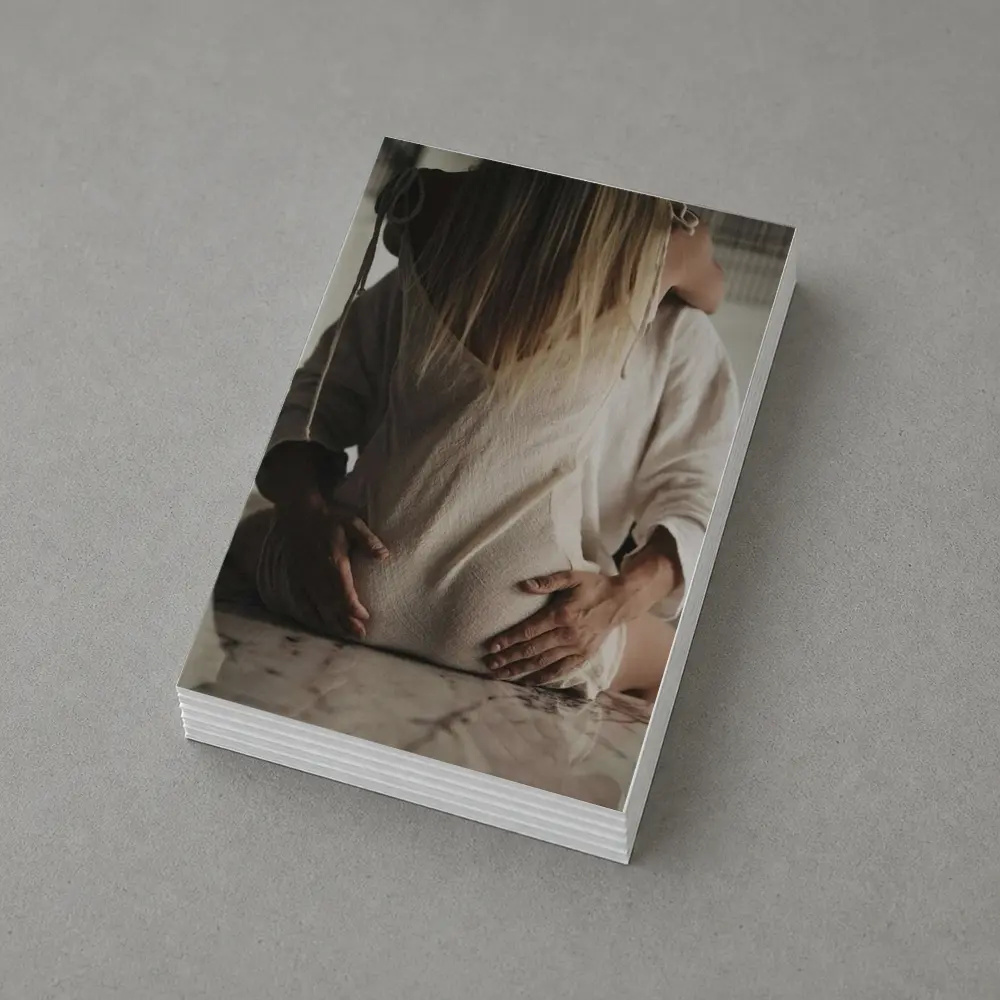 Pregnant Woman Couple Embrace Marble Table – Postcards