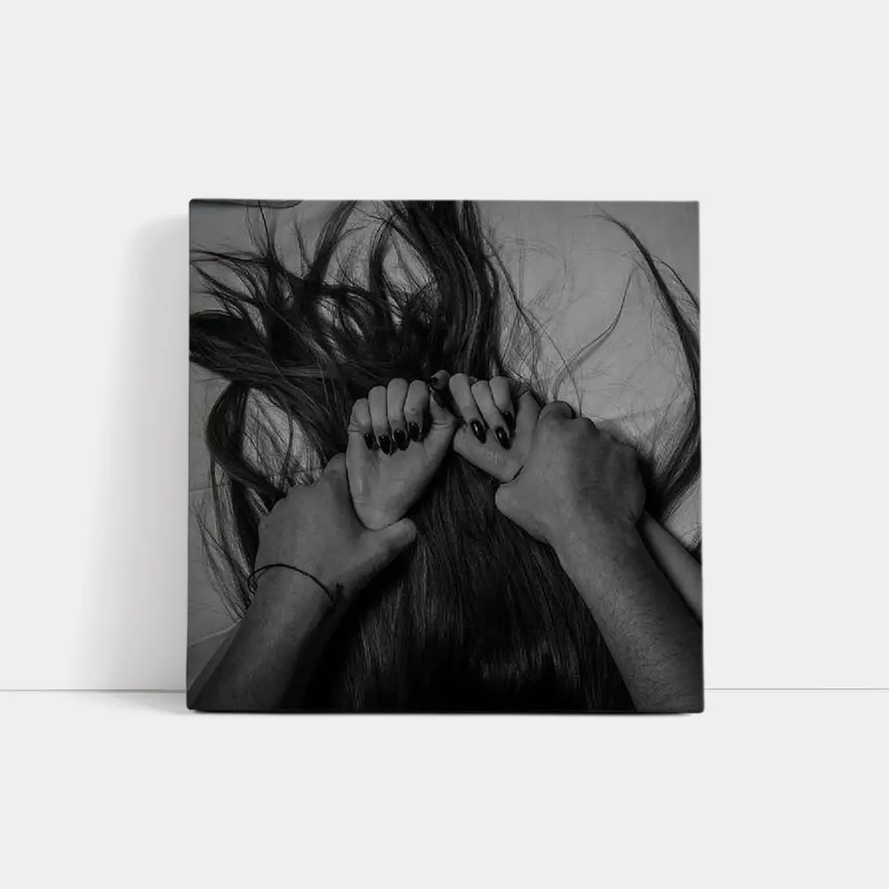 Black and White Hands Grasping Dark Hair – Wall Art