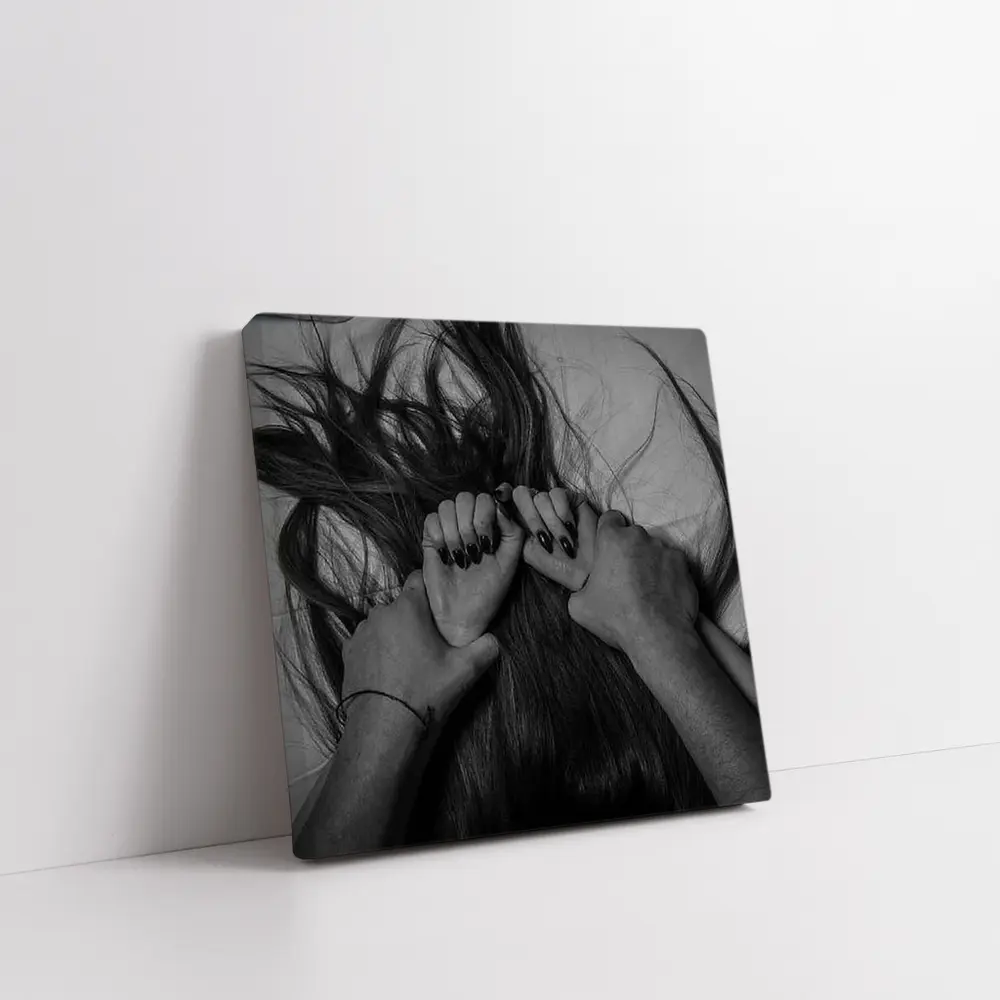 Black and White Hands Grasping Dark Hair – Wall Art