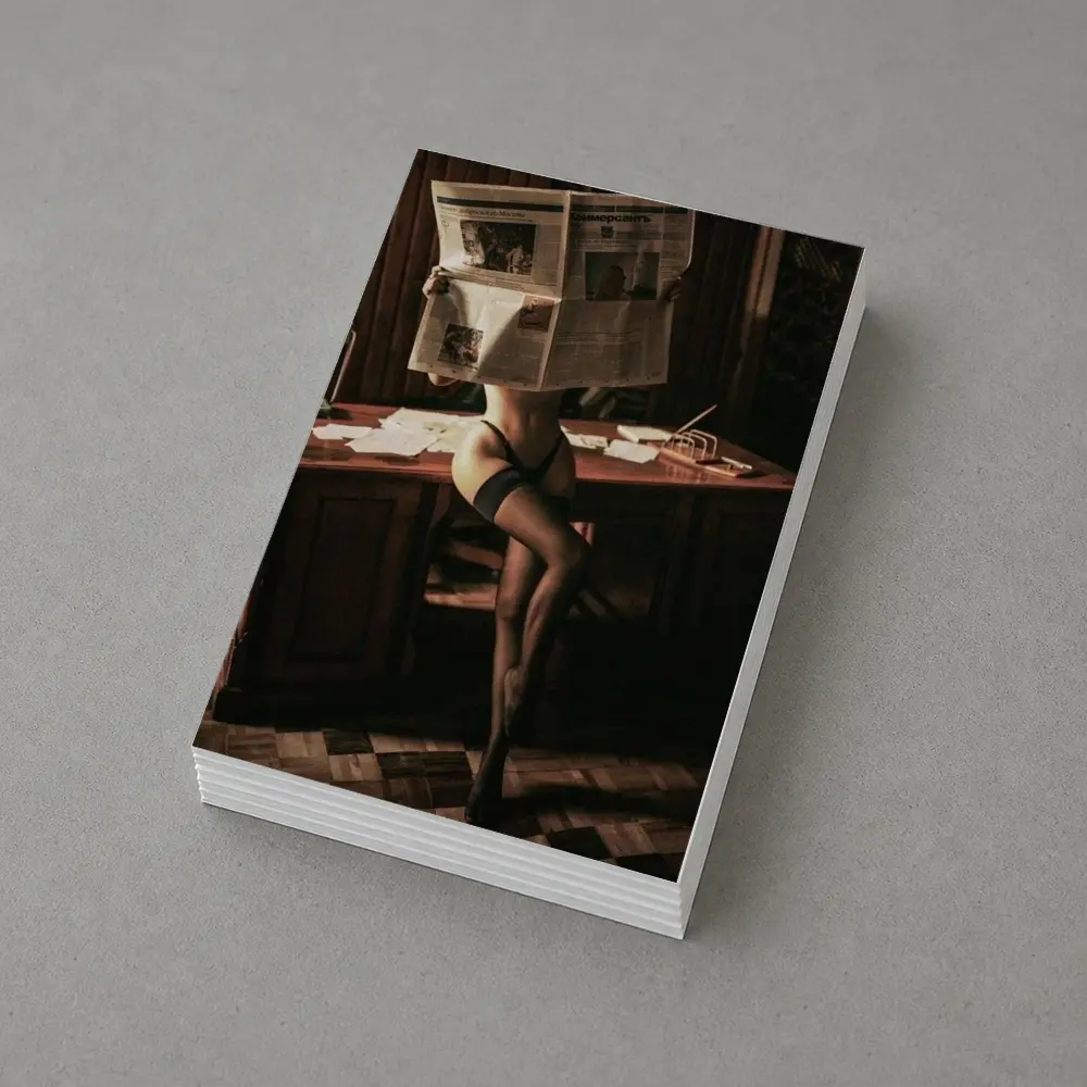 Sexy Woman Reading Newspaper at Office Desk – Postcards