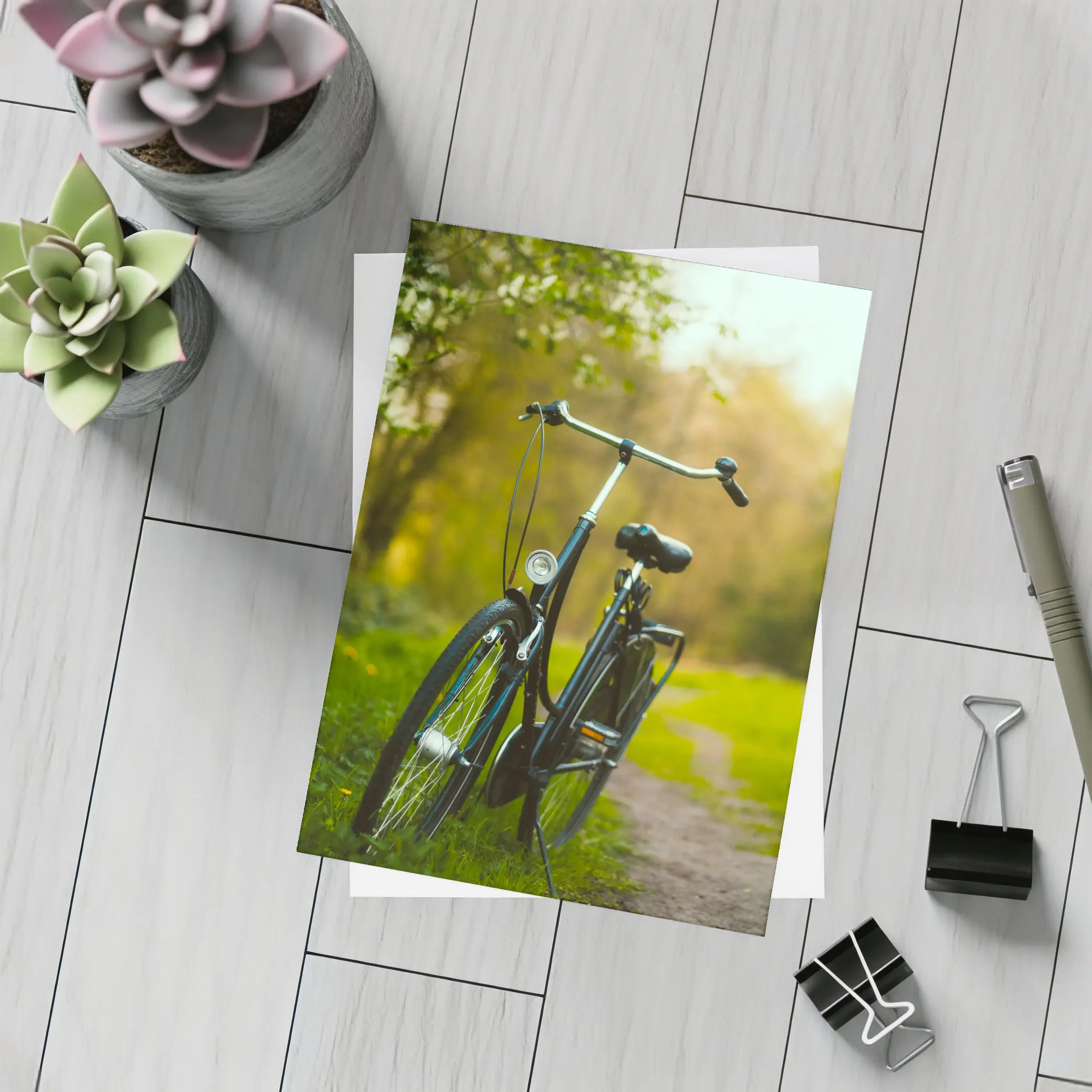 Black City Bicycle Parked On Green Path – Postcards