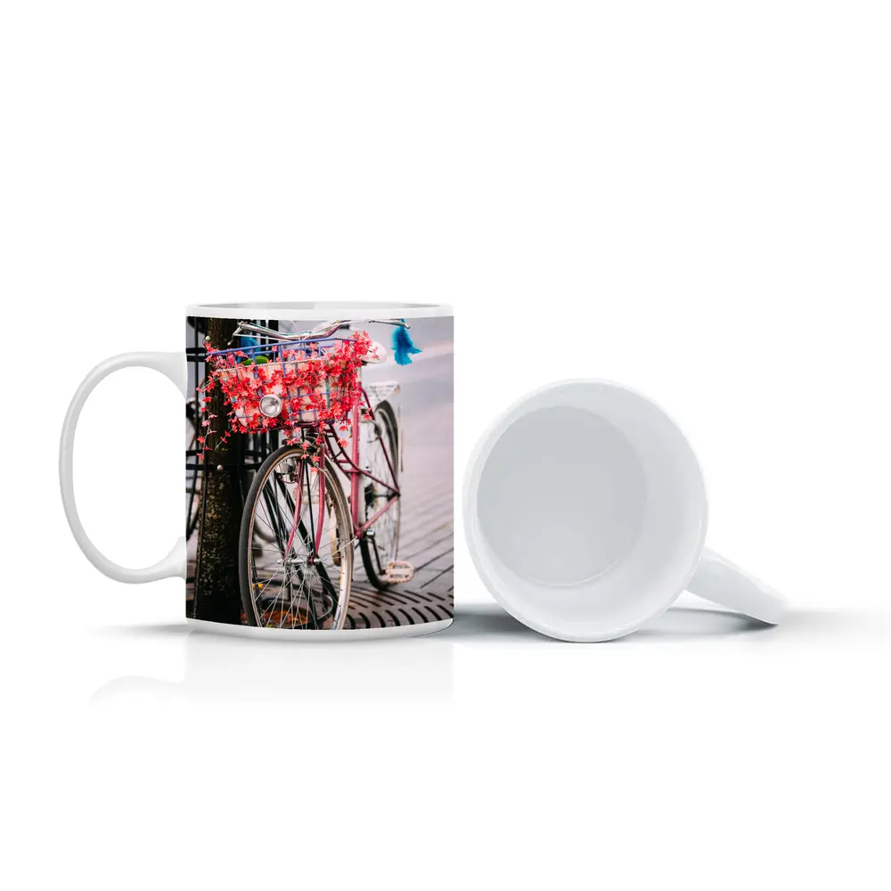Pink Bicycle With Flowers On City Street – Mugs